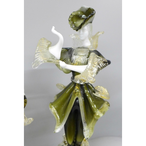 2009 - Two pairs of Murano figures to include a pair of Blackamoor figural candlesticks and a pair of sculp... 