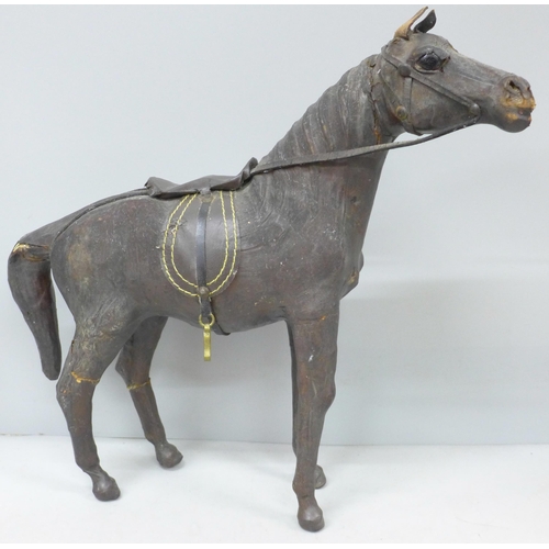 2013 - A leather covered model horse, 32cm, some a/f