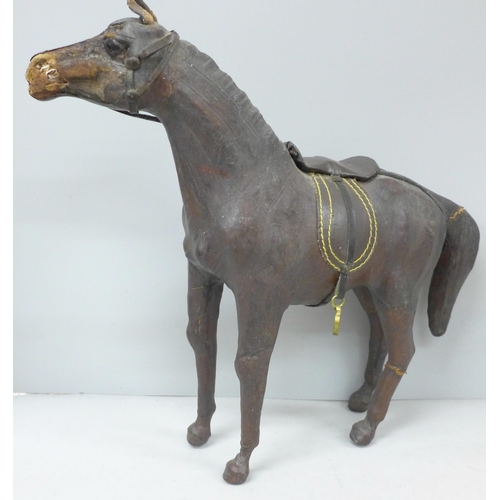 2013 - A leather covered model horse, 32cm, some a/f