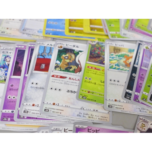 2030 - A large collection of Pokemon cards with holographic, in collectors box