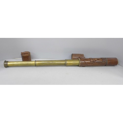 2031 - A brass telescope with leather case, 77cm extended