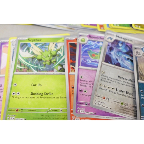 2039 - A collection of over 100 Pokemon cards including rare Black Star