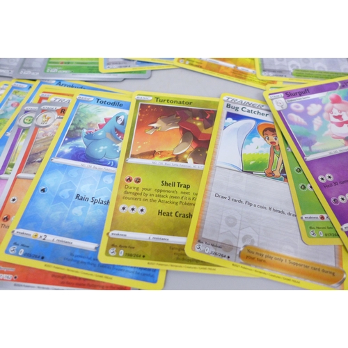 2053 - A collection of over 100 Pokemon cards including rare Black Star