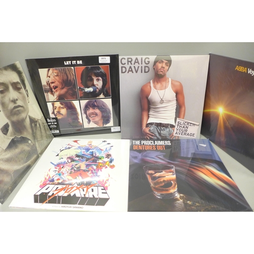 2073 - Thirteen new and sealed LP records including Abba Voyage, Bob Dylan, The Beatles, etc.