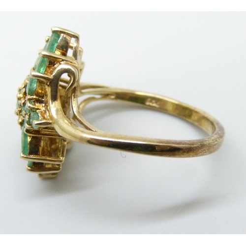 7070 - A 14ct gold plated silver ring set with 1.25cts of Zambian emeralds, O/P