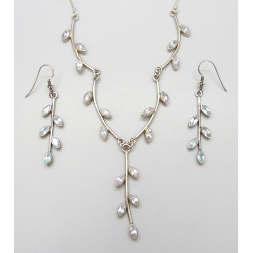 7071 - A silver and topaz necklace and earrings set, 29g,