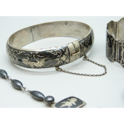 7075 - A collection of Siam silver niello jewellery, 108g