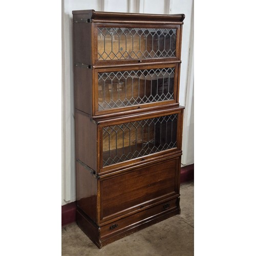 119 - An early 20th Century Globe Wernicke oak four tier sectional stacking bookcase