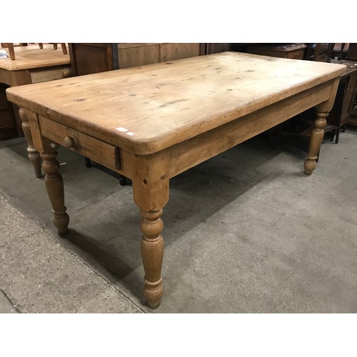 161 - A Victorian style pine farmhouse single drawer kitchen table