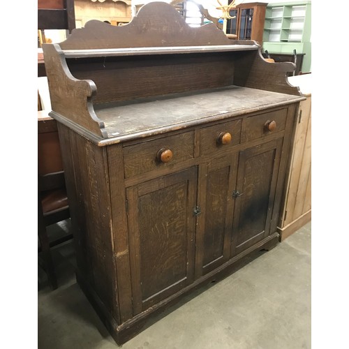 162 - A Victorian scumbled pine dresser