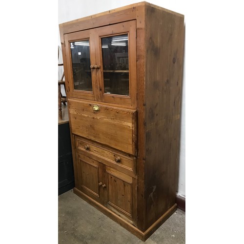 163 - A Victorian style pine estate cupboard