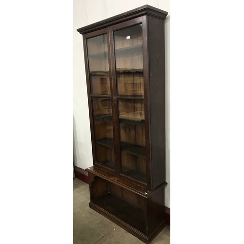 165 - A George III style oak bookcase