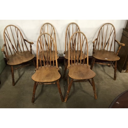 169 - A set of six elm and beech Windsor kitchen chairs