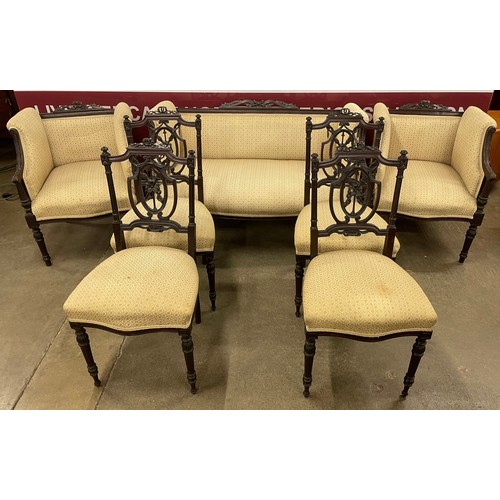 96 - An Edward VII mahogany and fabric upholstered seven piece salon suite, comprising; settee, pair of a... 