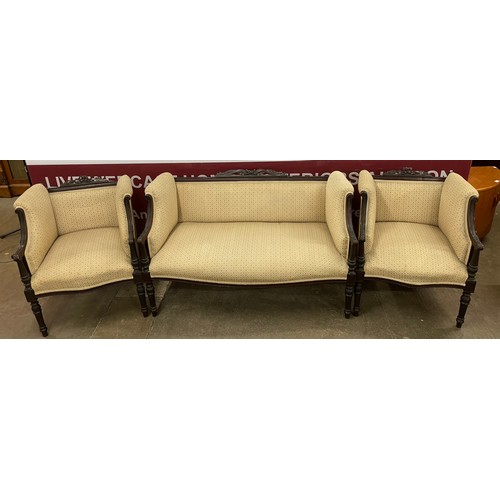 96 - An Edward VII mahogany and fabric upholstered seven piece salon suite, comprising; settee, pair of a... 