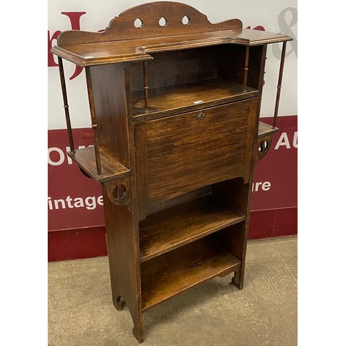 101 - An Arts and Crafts oak bureau bookcase