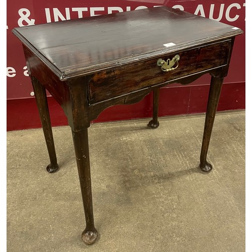 106 - A George II mahogany single drawer side table