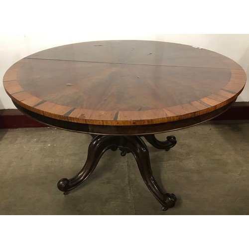 171 - An early Victorian segmented veneered mahogany and rosewood circular tilt top breakfast table