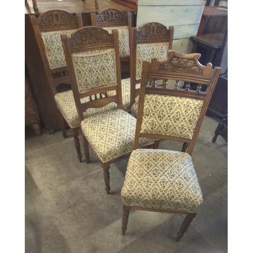 253 - A set of four Edward VII carved beech dining chairs and one other