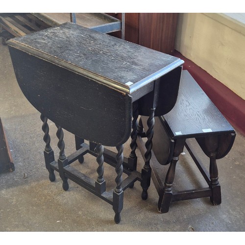 257 - An early 20th Century oak barleytwist gateleg table and an oak occasional table