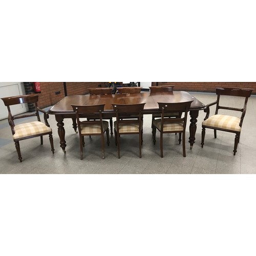 172 - A Victorian style mahogany extending table and eight chairs