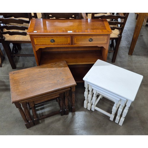 271 - A small Regency style yew wood open bookcase and two nests of tables