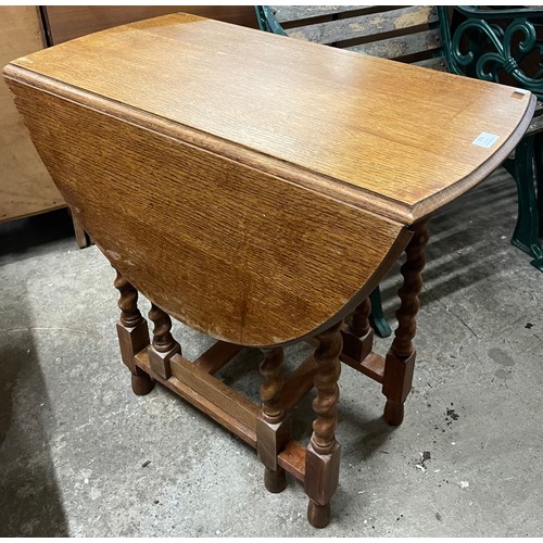 293 - An early 20th Century oak barleytwist gateleg table