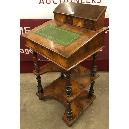 187 - A Victorian inlaid walnut Davenport top desk