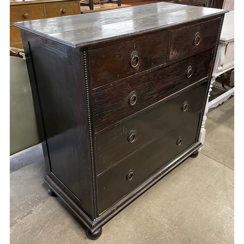 124 - An early 20th Century oak chest of drawers