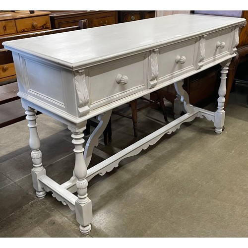 125 - A 19th Century French painted three drawer serving table