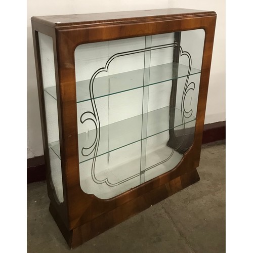 282 - An Art Deco walnut display cabinet