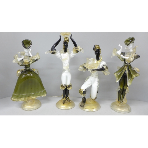 2009 - Two pairs of Murano figures to include a pair of Blackamoor figural candlesticks and a pair of sculp... 