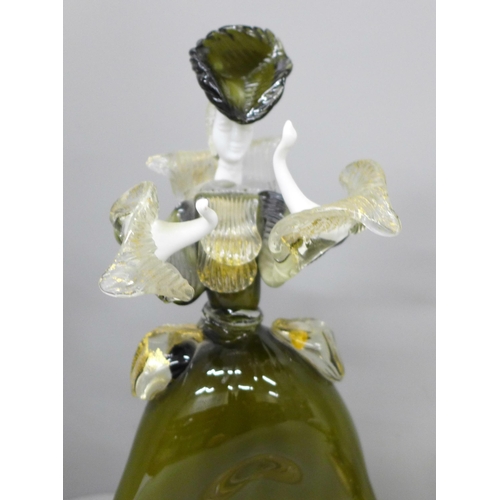 2009 - Two pairs of Murano figures to include a pair of Blackamoor figural candlesticks and a pair of sculp... 