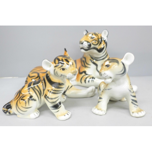 2010 - A Lomonosov model tiger marked made in Russia and two cubs marked made in USSR