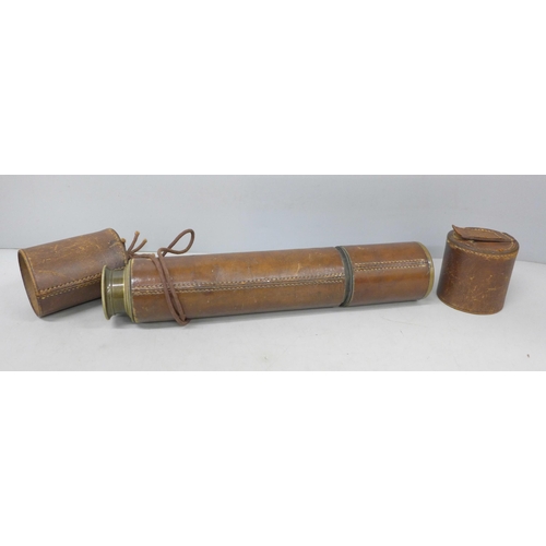 2031 - A brass telescope with leather case, 77cm extended