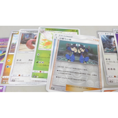 2036 - A collection of over 60 Japanese and Korean holographic Pokemon cards