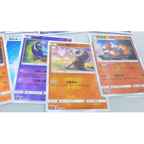 2036 - A collection of over 60 Japanese and Korean holographic Pokemon cards