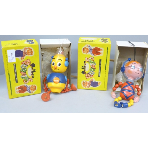 2038 - Two boxed Pelham puppets, Booster and Bleep, underneath the boxes personalised