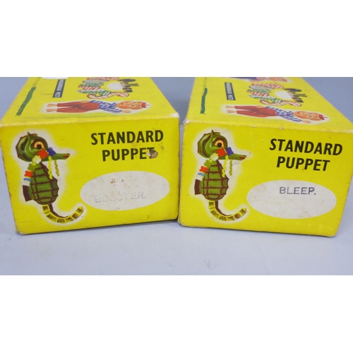 2038 - Two boxed Pelham puppets, Booster and Bleep, underneath the boxes personalised