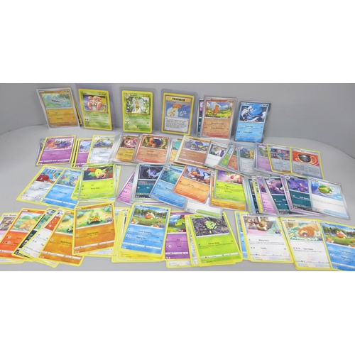 2050 - A large collection of Pokemon cards including holographic and vintage