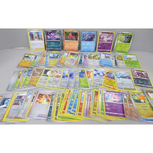 2053 - A collection of over 100 Pokemon cards including rare Black Star