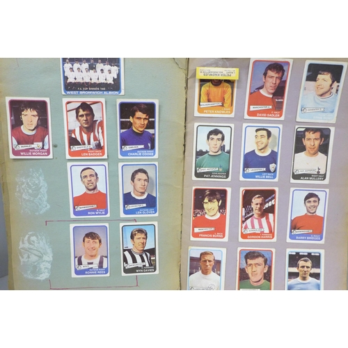 2081 - A football scrap book, mainly collectors cards, stuck in, some newspaper cuttings