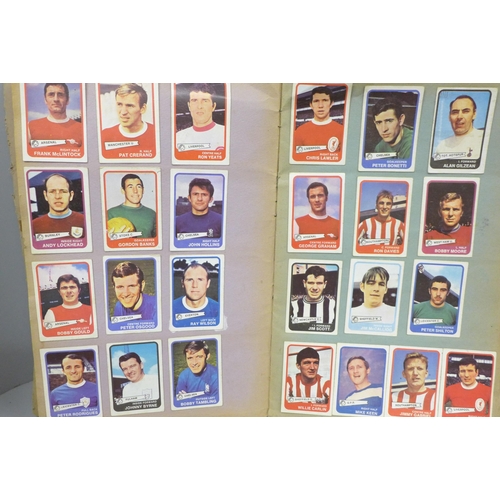 2081 - A football scrap book, mainly collectors cards, stuck in, some newspaper cuttings