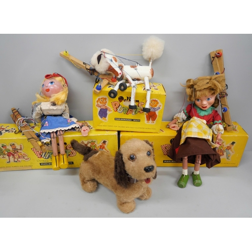 2120 - A collection of toys; three Pelham puppets, four Meercat toys and a dog