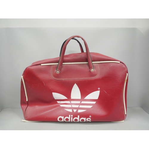 2146 - A Nottingham Forest backpack and a red Adidas holdall (a/f)