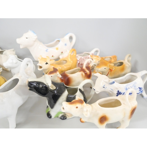 2170 - A collection of ceramic creamers/milk jugs in the form of cows