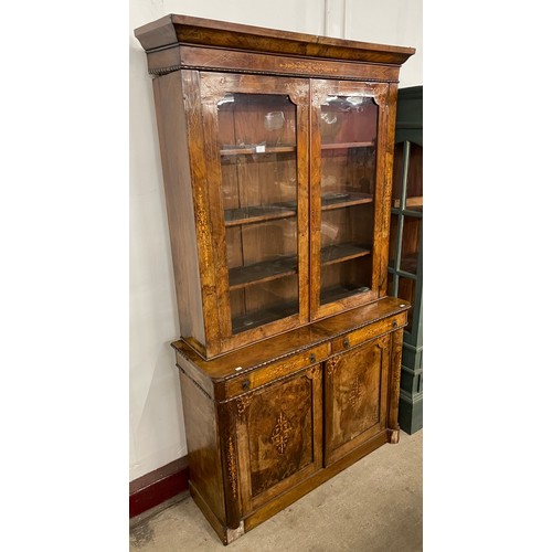 146 - A Victorian inlaid figured walnut bookcase