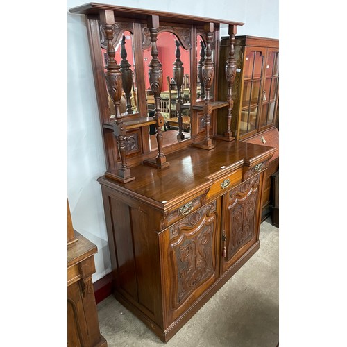 149 - A Victorian carved walnut mirrorback sideboard