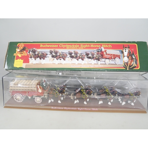 2223 - A boxed Budweiser Clydesdale Eight Horse hitch mechanical bank