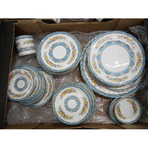 2237 - A collection of bone china Crown Staffordshire tea and dinnerware, in the blue Tunis pattern. Compri... 